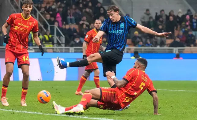 Inter Milan's Francesco Pio Esposito scores his side's opening goal during the Serie A soccer match between Inter Milan and Lecce in Milan, Italy, Wednesday, Jan. 14, 2026. (AP Photo/Luca Bruno)
