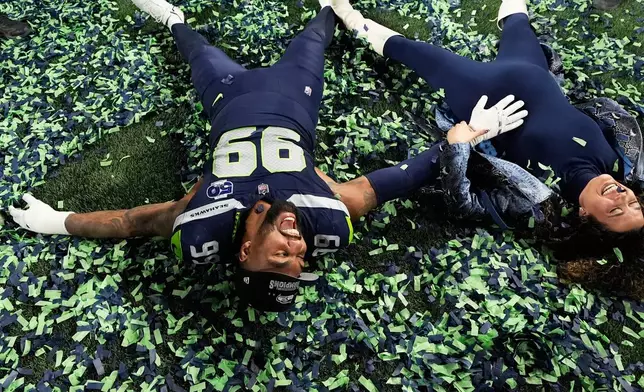 Seattle Seahawks defensive tackle Leonard Williams (99) celebrates after a win over the Los Angeles Rams in the NFC Championship NFL football game Sunday, Jan. 25, 2026, in Seattle. (AP Photo/Godofredo A. Vásquez)