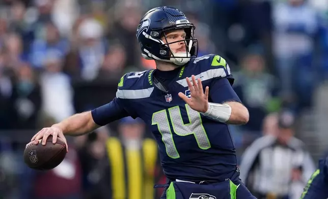 Seattle Seahawks quarterback Sam Darnold throws during the first half of the NFC Championship NFL football game against the Los Angeles Rams, Sunday, Jan. 25, 2026, in Seattle. (AP Photo/Godofredo A. Vásquez)