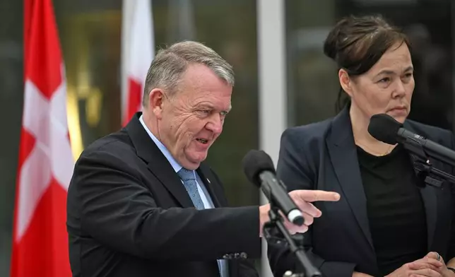 Denmark's Foreign Minister Lars Løkke Rasmussen and Greenland's Foreign Minister Vivian Motzfeldt speak at a news conference at the Embassy of Denmark, Wednesday, Jan. 14, 2026, in Washington. (AP Photo/John McDonnell)