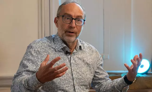 Jimmy Wales, founder of Wikipedia, gestures during an interview with The Associated Press on the occasion of Wikipedia's 25th anniversary in London, Monday, Jan. 12, 2026. (AP Photo/Frank Augstein)