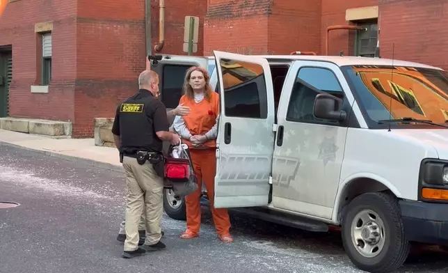 In this image from video, Jack LaSota, also known as Ziz, who is at the center of a cultlike group known as Zizians and linked to several deaths across the U.S., is escorted into court for a pretrial hearing on trespassing, gun and drug charges in Cumberland, Md., Friday, Jan. 16, 2026. (AP Photo/Mark Scolforo)