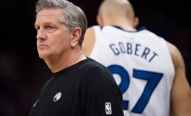 Minnesota Timberwolves Head Coach Chris Finch watches during the first half of an NBA basketball game between the Utah Jazz and the Minnesota Timberwolves Tuesday, Jan. 20, 2026, in Salt Lake City. (AP Photo/Bethany Baker)