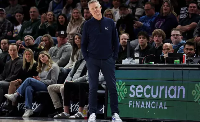 Golden State Warriors head coach Steve Kerr reacts during the first half of an NBA basketball game against the Minnesota Timberwolves, Sunday, Jan. 25, 2026, in Minneapolis. (AP Photo/Matt Krohn)