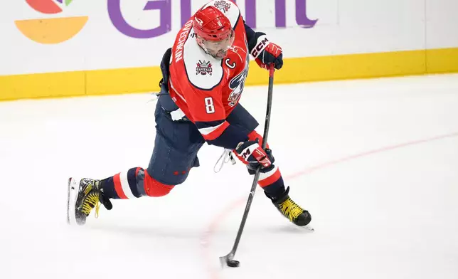 Washington Capitals left wing Alex Ovechkin shoots during the third period of an NHL hockey game against the Chicago Blackhawks, Saturday, Jan. 3, 2026, in Washington. (AP Photo/Nick Wass)
