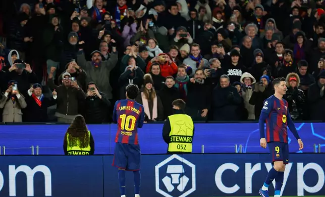 Barcelona's Lamine Yamal celebrates his side's second goal during the Champions League opening phase soccer match between Barcelona and Copenhagen in Barcelona, Spain, on Wednesday, Jan. 28, 2026. (AP Photo/Joan Monfort)