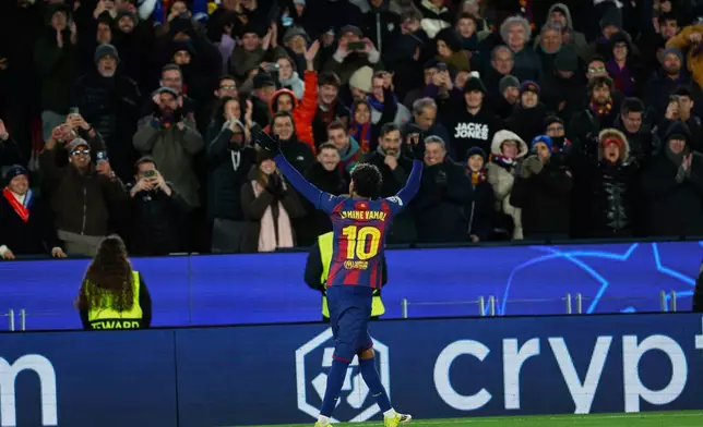 Barcelona's Lamine Yamal celebrates his side's second goal during the Champions League opening phase soccer match between Barcelona and Copenhagen in Barcelona, Spain, on Wednesday, Jan. 28, 2026. (AP Photo/Joan Monfort)