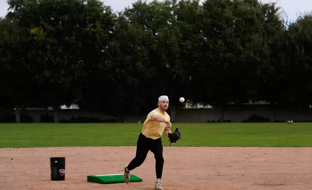 Daulton Jefferies throws a pitch while working out at Heather Farms Park in Walnut Creek, Calif., Saturday, Dec. 13, 2025. (AP Photo/Godofredo A. Vásquez)