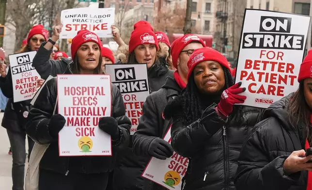 Striking nurses demonstrate outside Mt. Sinai Morningside Hospital, in New York, Wednesday, Jan. 14, 2026. (AP Photo/Richard Drew)