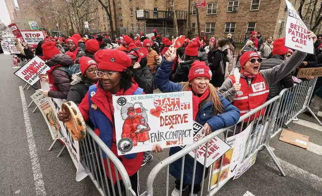 Striking nurses demonstrate outside Mt. Sinai Hospital, in New York, Wednesday, Jan. 14, 2026. (AP Photo/Richard Drew)