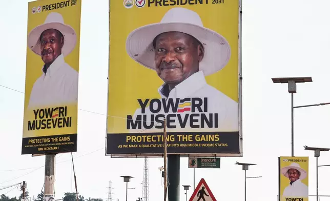 Billboards of Uganda President and National Resistance Movement (NRM) presidential candidate Yoweri Museveni are seen in Kampala, Uganda, Tuesday, Jan. 13, 2026. (AP Photo/Samson Otieno)