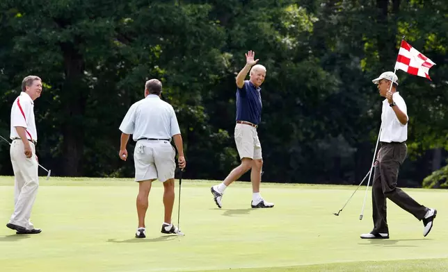 FILE - President Barack Obama, from right, Vice President Joe Biden, House Speaker John Boehner, R-Ohio, and Ohio Gov. John Kasich walk on the first green during a round of golf at Andrews Air Force Base, Md., June 18, 2011. (AP Photo/Charles Dharapak, File)