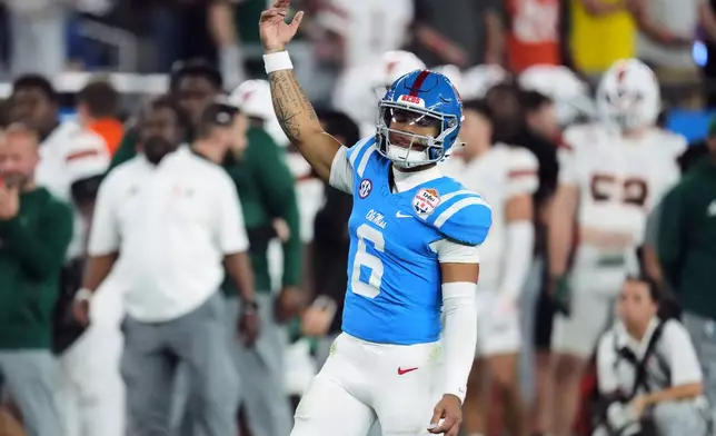 Mississippi quarterback Trinidad Chambliss (6) celebrates after a two-point conversion during the second half of the Fiesta Bowl NCAA college football playoff semifinal game against Miami, Thursday, Jan. 8, 2026, in Glendale, Ariz. (AP Photo/Ross D. Franklin)