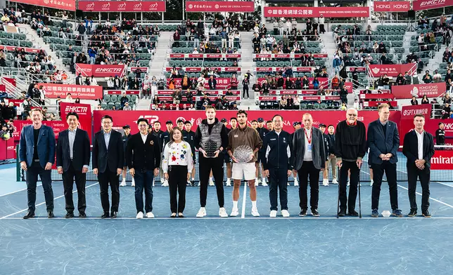 Mr. Mark Woodforde, Mr. Oscar Chow, Mr. Sun Yu, Mr. Kenneth Fok, Miss Rosanna Law, Mr. Alexander Bublik, Mr. Lorenzo Musetti, Mr. Michael Cheng, Mr. Wilfred Ng, Mr. Ed Hardisty, Mr. Roland Herfel, Mr. Pat Cash pose for photos at the Bank of China Hong K