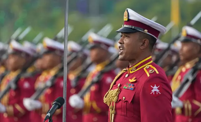 A commander of an honor guard shouts during a ceremony marking the 78th anniversary of its Independence Day in Naypyitaw, Myanmar, Sunday, Jan. 4, 2026. (AP Photo/Aung Shine Oo)