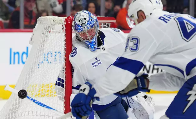 Tampa Bay Lightning goaltender Andrei Vasilevskiy makes a save during the second period of an NHL hockey game against the Philadelphia Flyers, Saturday, Jan. 10, 2026, in Philadelphia. (AP Photo/Derik Hamilton)