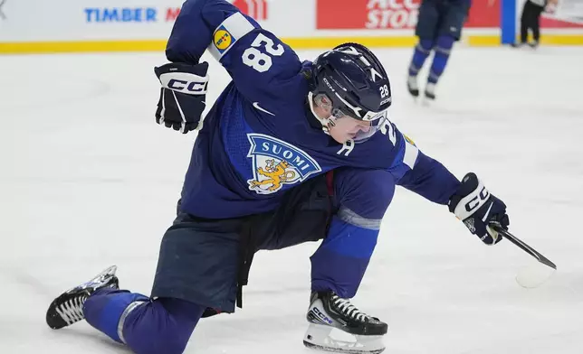 Finland forward Heikki Ruohonen celebrates after scoring a goal during the second period of an IIHF World Junior Hockey Championship quarterfinals game against the United States, Friday, Jan. 2, 2026, in St. Paul, Minn. (AP Photo/Abbie Parr)