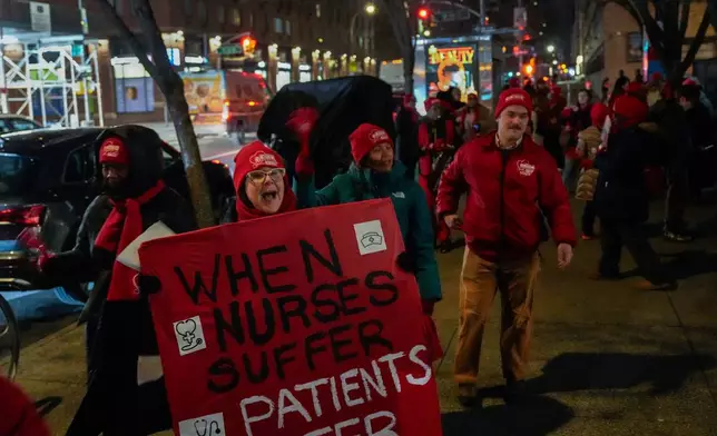 Nurses strike outside Mount Sinai West Hospital, Monday, Jan. 12, 2026, in New York. (AP Photo/Yuki Iwamura)