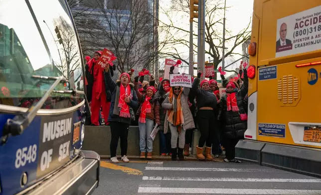 Nurses strike outside New York-Presbyterian Hospital, Monday, Jan. 12, 2026, in New York. (AP Photo/Yuki Iwamura)