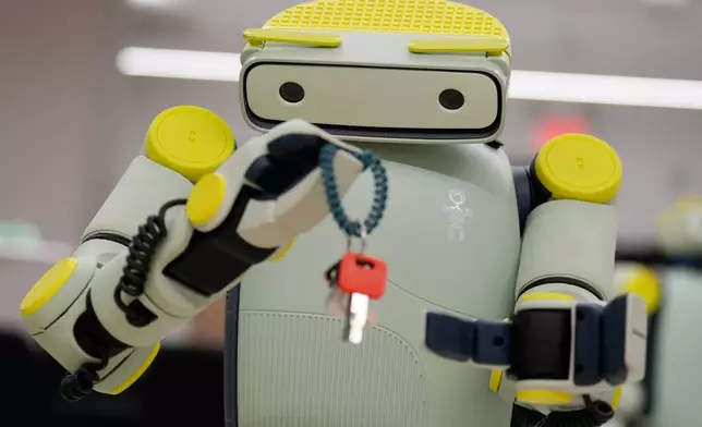 While being operated remotely, Fauna Robotics' new robot named Sprout shows off its dexterity in New York, Wednesday, Jan. 14, 2026. (AP Photo/Seth Wenig)