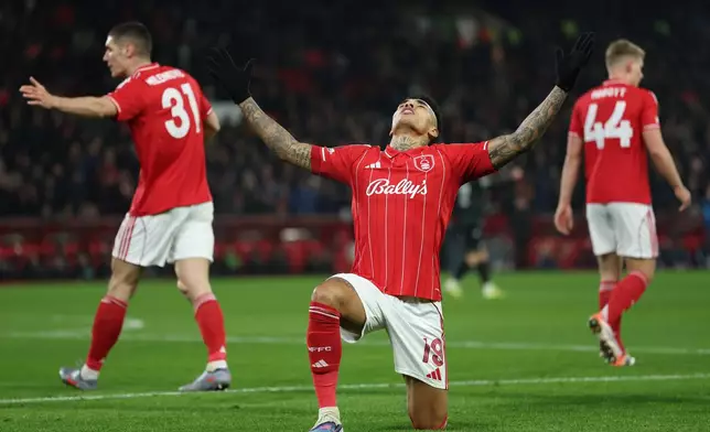 Nottingham Forest's Igor Jesus, centre, celebrates after he scores his side's second goal during the Europa League opening phase soccer match between Nottingham Forest and Ferencvaros in Nottingham, England, Thursday, Jan. 29, 2026. (AP Photo/Morgan Harlow)