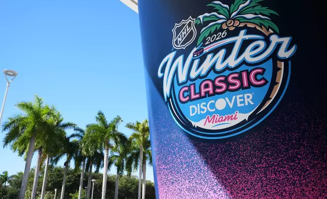 A sign for the upcoming NHL Winter Classic hockey game between the Florida Panthers and New York Rangers is posted at loanDepot Park in Miami. (AP Photo/Lynne Sladky)