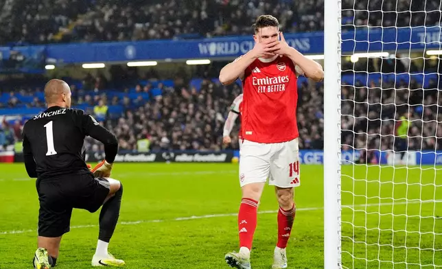 Arsenal's Viktor Gyoekeres celebrates after scoring his side’s second goal during the English League Cup semifinal first leg soccer match between Chelsea and Arsenal in London, Wednesday, Jan. 14, 2026. (Nick Potts/PA via AP)