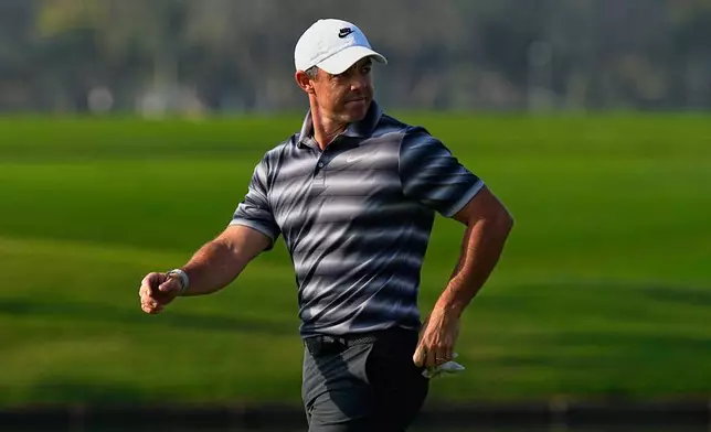 Rory McIlroy of Northern Ireland walks during the first round of Dubai Invitational golf tournament in Dubai, United Arab Emirates, Thursday, Jan. 15, 2026. (AP Photo/Fatima Shbair)