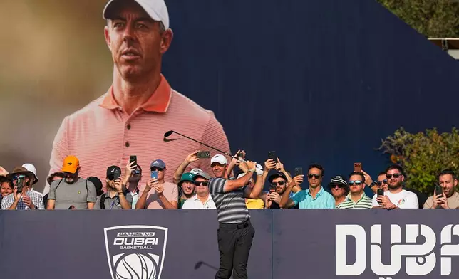 Rory McIlroy of Northern Ireland hits off the first tee during the first round of Dubai Invitational golf tournament in Dubai, United Arab Emirates, Thursday, Jan. 15, 2026. (AP Photo/Fatima Shbair)