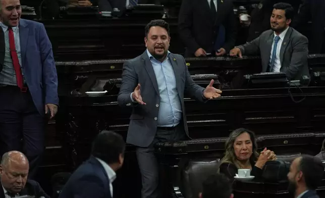 Opposition lawmaker Ronald Portillo speaks during a debate on whether to ratify the state of emergency decreed by Guatemalan President Bernardo Arévalo following an escalation of gang-related violence, in Guatemala City, Monday, Jan. 19, 2026. (AP Photo/Moises Castillo)