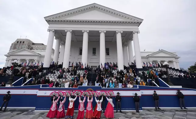Gov. Abigail Spanberger attends an inaugural ceremony with her family after she was sworn in as Virginia's first female governor, at the Capitol in Richmond Va., Saturday, Jan. 17, 2026.(AP Photo/Stephanie Scarbrough)