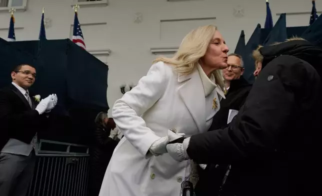Virginia Gov. Abigail Spanberger arrives inaugural ceremonies at the Capitol in Richmond Va., Saturday Jan. 17, 2026. (AP Photo/Steve Helber, Pool)