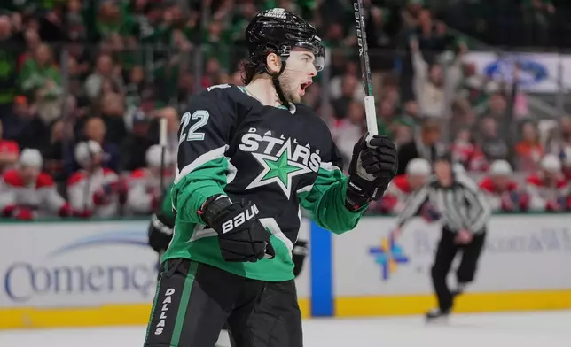 Dallas Stars center Mavrik Bourque reacts after scoring during the first period of an NHL hockey game against the Montréal Canadiens, Sunday, Jan. 4, 2026, in Dallas. (AP Photo/LM Otero)