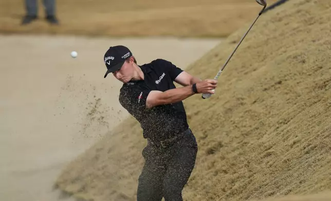 Blades Brown hits out of a bunker at the 8th hole during the final round of the American Express golf event on the Pete Dye Stadium Course at PGA West Sunday, Jan. 25, 2026, in La Quinta, Calif. (AP Photo/Ross D. Franklin)