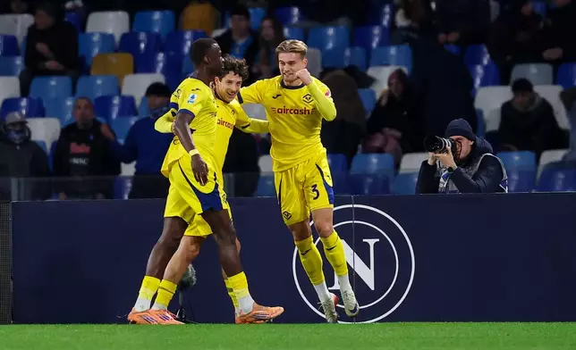 Verona's Martin Frese celebrates after scoring their side's first goal of the game during the Serie A soccer match between Napoli and Verona in Naples, Italy, Wednesday, Jan. 7, 2026. (Alessandro Garofalo/LaPresse via AP)