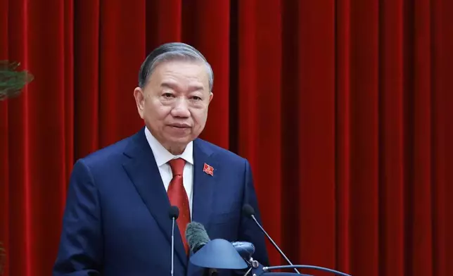 Vietnam's General Secretary of the Communist Party To Lam speaks after being re-elected to the position following a National Congress in Hanoi, Vietnam, Friday, Jan. 23, 2026. (Hoang Thong Nhat/VNA via AP)
