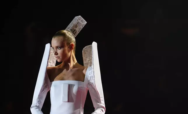 A model wears a creation as part of the Stephane Rolland Spring/Summer 2026 Haute Couture collection presented in Paris, Tuesday, Jan. 27, 2026. (AP Photo/Aurelien Morissard)