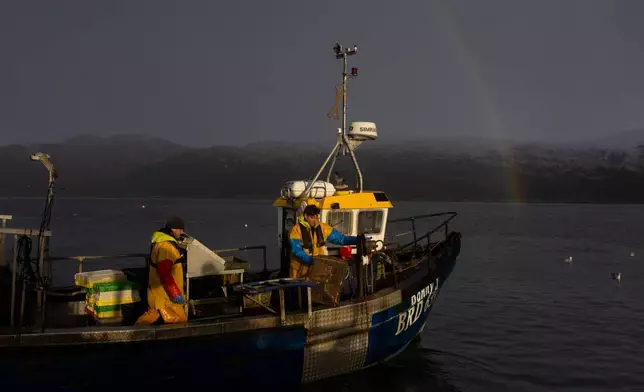 Small-scale creel fishermen operate in Loch Alsh next to the Isle of Skye on Nov. 20, 2025, in Scotland. (AP Photo/Emily Whitney)