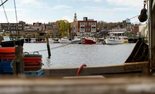 FILE - Fishing boats are docked in the harbor of Gloucester, Mass., May 11, 2022. (AP Photo/David Goldman, File)