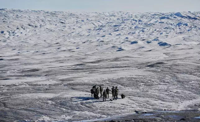 FILE - Danish military forces participate in an exercise with hundreds of troops from several European NATO members in Kangerlussuaq, Greenland, Sept. 17, 2025. (AP Photo/Ebrahim Noroozi, File)