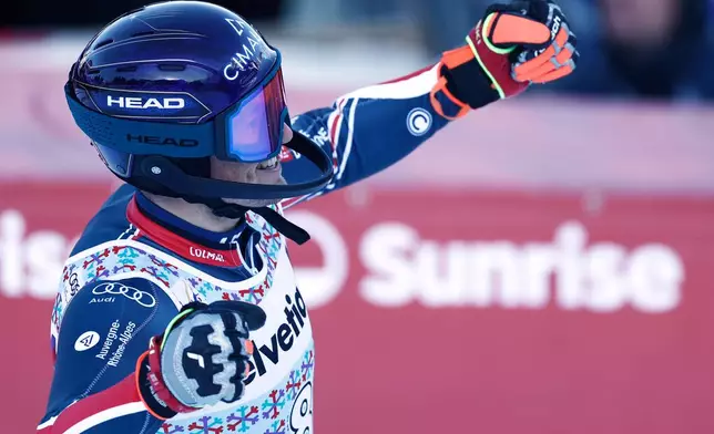 France's Paco Rassat reacts at the finish line during an alpine ski, men's World Cup slalom, in Adelboden, Switzerland, Sunday, Jan. 11, 2026. (AP Photo/Gabriele Facciotti)