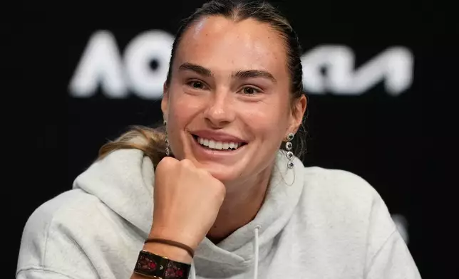 Aryna Sabalenka of Belarus reacts during a press conference ahead of the Australian Open tennis championship in Melbourne, Australia, Friday, Jan. 16, 2026. (AP Photo/Aaron Favila)