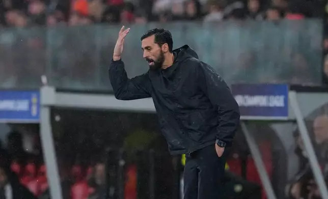 Real Madrid's head coach Alvaro Arbeloa gestures during a Champions League opening phase soccer match between Benfica and Real Madrid, in Lisbon, Wednesday, Jan. 28, 2026. (AP Photo/Armando Franca)