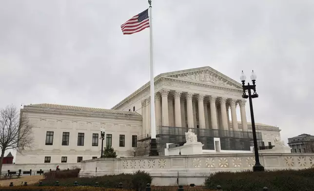 U.S. Supreme Court is seen, Wednesday, Jan. 14, 2026, in Washington. (AP Photo/Rahmat Gul)