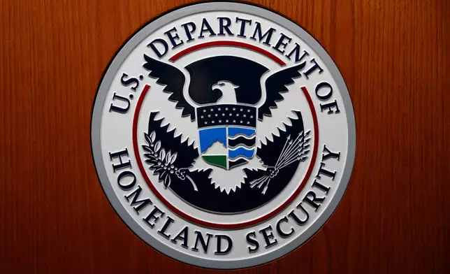 FILE - The Department of Homeland Security (DHS) seal during a news conference June 28, 2019, in Washington. (AP Photo/Carolyn Kaster, File)