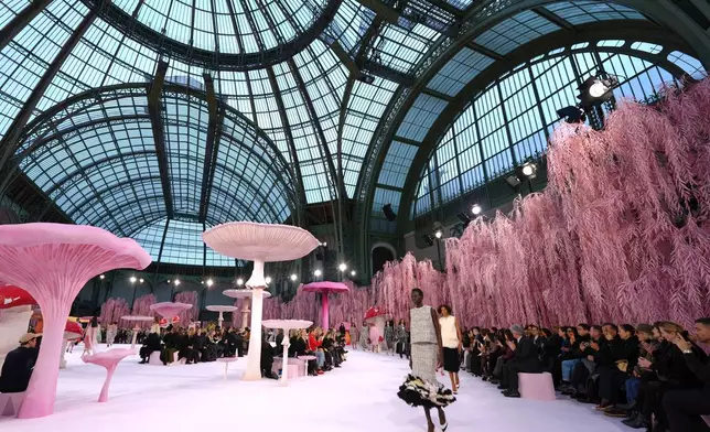 A model wears a creation as part of the Chanel Spring/Summer 2026 Haute Couture collection presented in Paris, Tuesday, Jan. 27, 2026. (AP Photo/Aurelien Morissard)