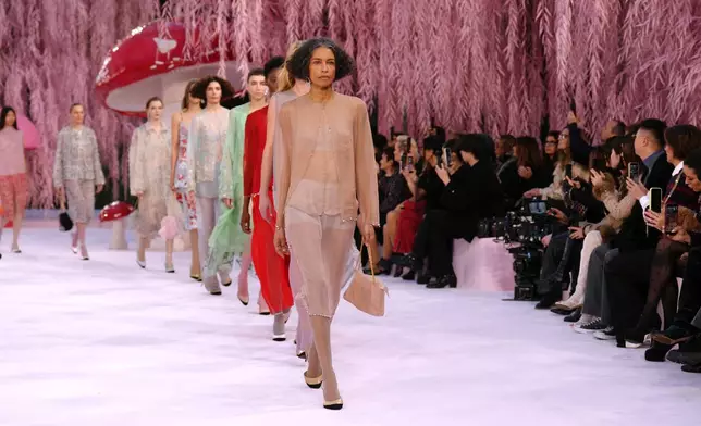 Models wear creations as part of the Chanel Spring/Summer 2026 Haute Couture collection presented in Paris, Tuesday, Jan. 27, 2026. (AP Photo/Aurelien Morissard)