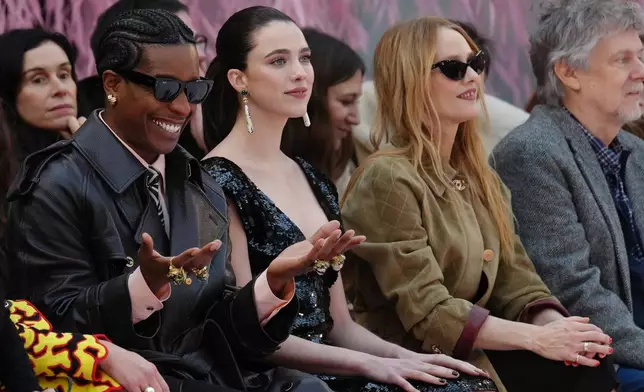 A$AP Rocky, from left, Margaret Qualley and Vanessa Paradis attend the Chanel Spring/Summer 2026 Haute Couture collection presented in Paris, Tuesday, Jan. 27, 2026. (AP Photo/Aurelien Morissard)