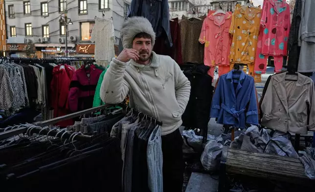 A vendor waits for customers at Tajrish Square in Tehran, Iran, Tuesday, Jan. 27, 2026. (AP Photo/Vahid Salemi)