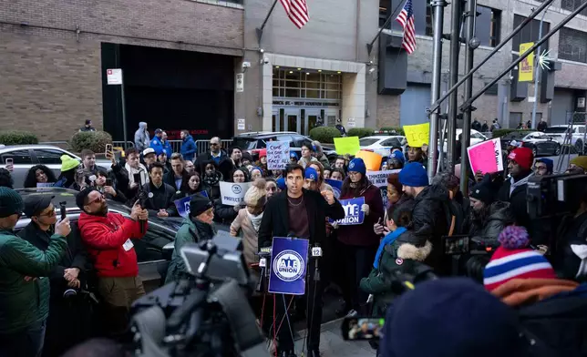 Carlos Calzadilla, President of Brooklyn Young Democrats, speaks during a news conference outside Greater New York Federal Building, Tuesday, Jan. 13, 2026, in New York. (AP Photo/Yuki Iwamura)